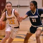 File photos by Kevin Hanson
Maggee Schmitz (#22), last seasons NPSL 3A Player of the Year, returns for a junior season.