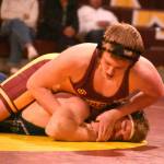 PHOTO BY KEVIN HANSON 
Wrestling at 165 pounds during Enumclaws December 3 home victory over Todd Beamer High was sophomore Carson Lee.