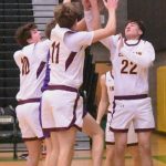 PHOTO BY KEVIN HANSON A trio of Hornets battle for a rebound during Saturday mornings game against Sumner. Pictured are Gavin Trachte (#10), Jason Feddema (#11) and Carson Tice (#22).
