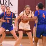 During a mid-December victory over Auburn Mountainview, Enumclaw freshman Kayla Feddema (in front) and junior Kaidyn Johnson apply the type of defensive pressure that led to an easy victory.