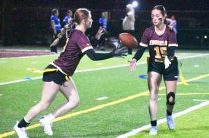 PHOTO BY KEVIN HANSON Brynn Findley takes a pitch from Madison Holden during a Hornet victory last week.