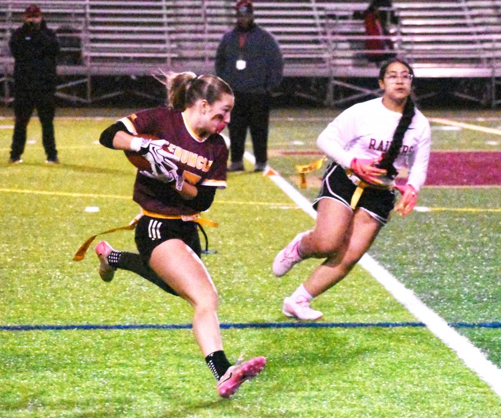 PHOTO BY KEVIN HANSON Sutton Kelsey races for a big gain during Enumclaws January 14 victory over Thomas Jefferson.