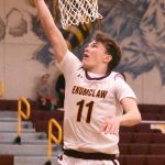 PHOTOs BY KEVIN HANSON
The Hornets Jason Feddema goes high for an uncontested layup against the Kentlake Falcons.
