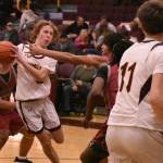 PHOTO BY KEVIN HANSON
Hornet junior Jack Blair maneuvers through the lane during Enumclaw's lopsided, Saturday night victory over Kentlake.