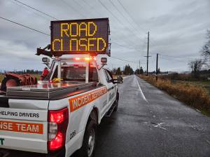 The Washington State Department of Transportation has no estimate for when SR 169 will re-open after a power line fell earlier this morning. Photo by Ray Miller-Still