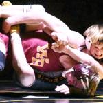 PHOTO BY KEVIN HANSON
One of Enumclaw High's victories during a dual meet with White River was delivered by Bo Bruhn, who has the advantage in this photo.