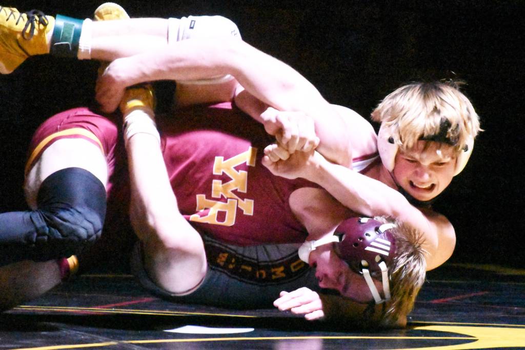 PHOTO BY KEVIN HANSON
One of Enumclaw High's victories during a dual meet with White River was delivered by Bo Bruhn, who has the advantage in this photo.