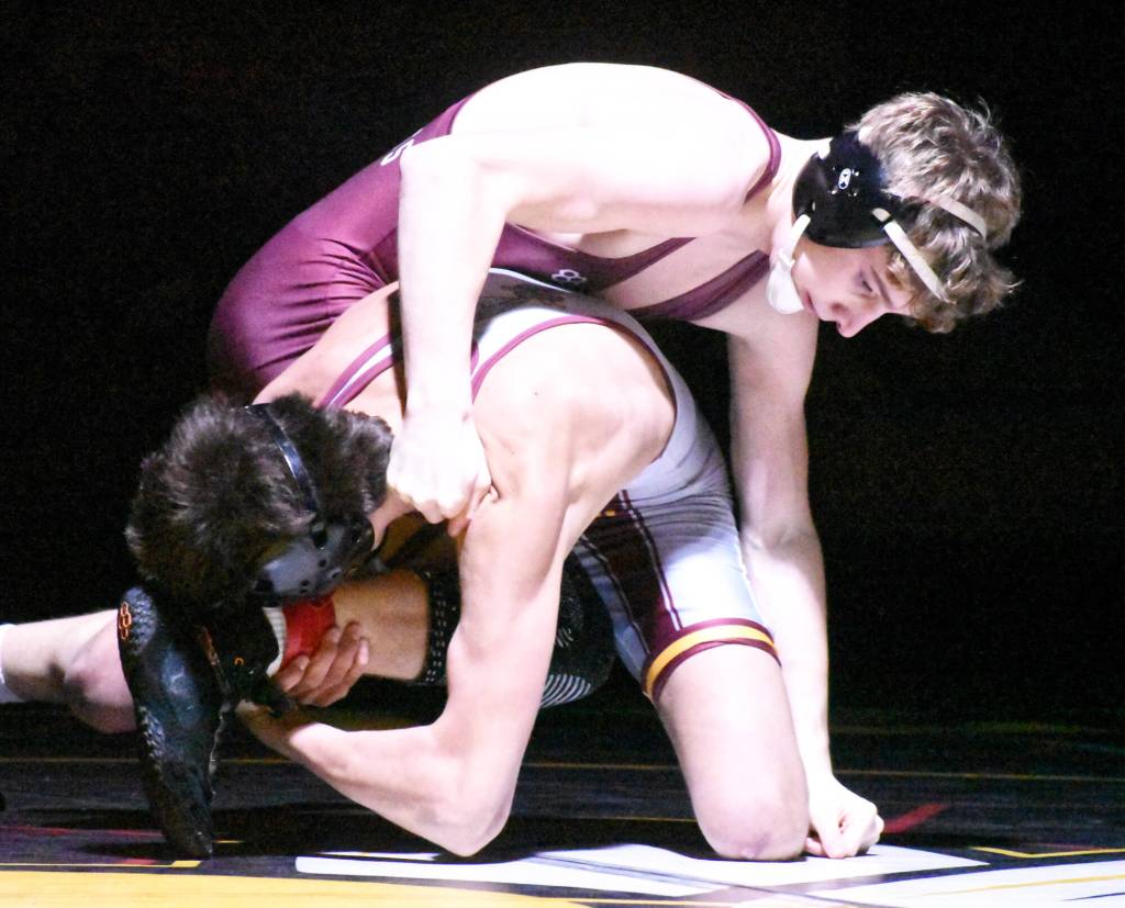 PHOTO BY KEVIN HANSON
White River's Josh Hanson on his way to a victory at 165 pounds during his team's dual-meet victory over Enumclaw.