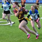 PHOTO BY KEVIN HANSON Jayna Vain (#2) turns the corner and picks up yardage during the early stages of White Rivers state tournament victory.