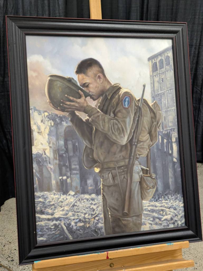 Nisei veterans were those who were drafted to serve in the war after being incarcerated by their own governmentn in the United States. This painting by Chris Hopkins captures a moment of that experience. Photo by Bailey Jo Josie/Sound Publishing