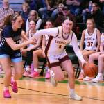 PHOTOs BY KEVIN HANSON 
Enumclaw High junior Kaidyn Johnson races downcourt during the Hornets state tournament game.