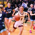 Callie Almli looks for an open lane to the hoop during Saturdays state tourney contest against Meadowdale.