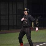 Kannius Alva pounds his chest after hitting a triple in the second inning for Enumclaw. Ben Ray / The Herald