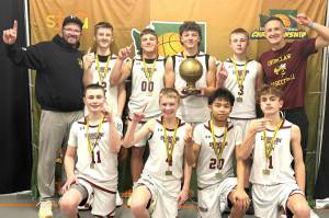 SUBMITTED PHOTO
The state champion seventh-grade team from Enumclaw: in front (from left) are Logan Johnson, Wyatt Oliver, Payton Mercado and Tyson Thomas; in back are coach Casey Hanson, Case Stratton, Levi Hanson, Bo Barnes, Jace Martel and coach Cameron Stratton.