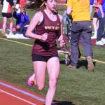 PHOTO BY KEVIN HANSON White Rivers Paeton Poelman dominated the distance events Thursday afternoon, winning both the 1,600- and 3,200-meter races.