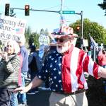 Ron Montgomery spent his time at the No Kings protest singing and evangelizing. Photo by Ray Miller-Still