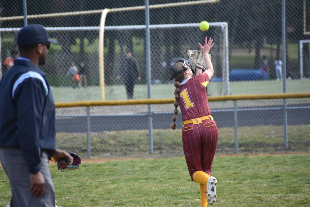 Abby Akins makes an over the shoulder catch. Ben Ray / The Reporter