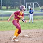 Abby Akins runs the bases after one of her two doubles against Decatur. Ben Ray / The Herald.