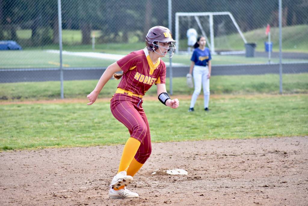 Abby Akins runs the bases after one of her two doubles against Decatur. Ben Ray / The Herald.