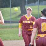 White River infield toss the ball around after a strikeout against Decatur. Ben Ray / The Mirror