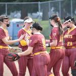The White River infield shakes hands in between innings against Decatur. Ben Ray / The Herald