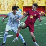 PHOTO BY KEVIN HANSON White River junior Dylan Berdan (#16) battles a Decatur defender for ball control during the early stages of Friday nights NPSL 3A game at Arrow Lumber Stadium. The visiting Gators left the Buckley campus with a 2-0 victory.