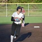 Blake Hanson runs to third base for Enumclaw. Ben Ray / Sound Publishing