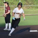 Brynn Findley rounds second base for Enumclaw. Ben Ray / Sound Publishing