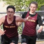 PHOTOs BY KEVIN HANSON 
Both the boys and girls track and field teams from White River were successful Thursday afternoon, defeating the visitors from Todd Beamer High. In this photo, Hunter Maris takes the baton from Aiden Roberts and runs the anchor leg in the 4x100 relay.