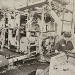 File photo
Until 1927 The Courier-Herald was printed in the back shop of the newspaper, wherever it might be calling home. This photo is the back of the current building at 1627 Cole Street. Typesetters in the foreground at left are preparing copy for printing on the presses against the wall to the left.