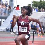 Jasmine Johnson runs for Kentlake. Ben Ray / Sound Publishing