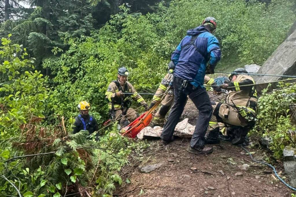 Numerous agencies were involved in the rescue of two individuals whose vehicle fell over a cliff near T-Rex Falls last Thursday. Photo courtesy Pierce County Sheriffs Department